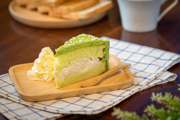 Pandan cake with young coconut butter cream.