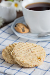 Homemade almond cookies with a cup of coffee.