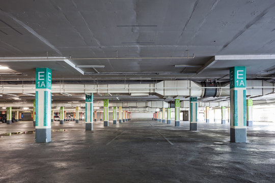 Empty parking garage underground interior in supermarket.