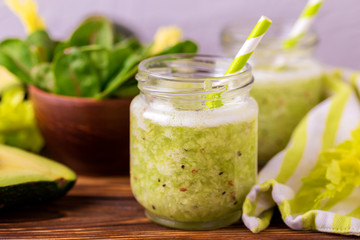 Green smoothie with avocado, spinach and celery. Healthy food