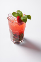 Mojito strawberry cocktail. closeup isolated on white background.