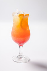 Tequila sunrise cocktail with ice on white background. Isolated