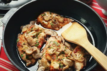 Frying pan with delicious chicken marsala, closeup