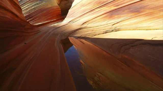 Gliding view over a pool of water in the Wave.