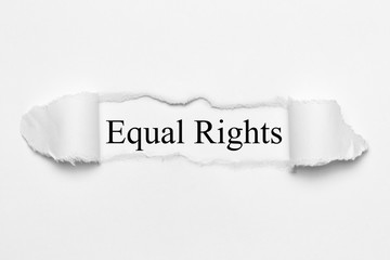 Equal Rights on white torn paper