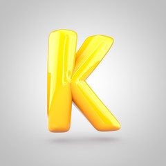 Glossy yellow paint letter K uppercase