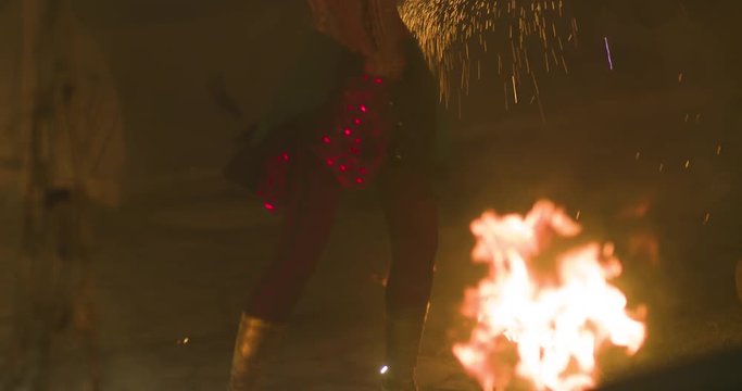 Fire performer woman, fire show. Slow motion