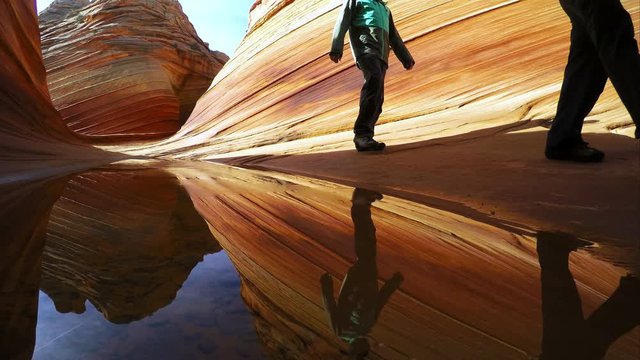 People walking through the Wave