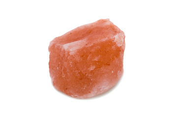 Closeup of Himalayan pink rock salt Isolated over white background