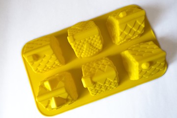 Bright yellow silicone baking case (house shaped)