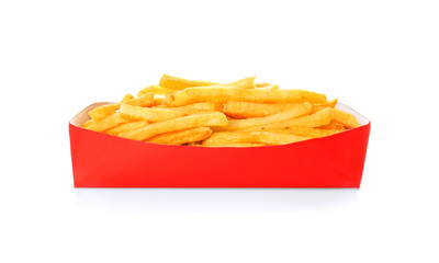 Paper red box full of delicious french fries on white background