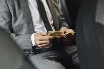 man counting euro bills