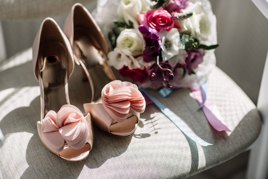 Women's Casual And Luxurious Shoes. Women's Shoes On The Bed. So Many Different Shoes.