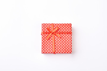 Beautiful red gift on white background.