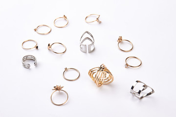 Many different rings on a white background.