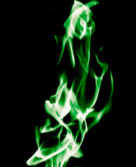 Green flame of fire on a black background