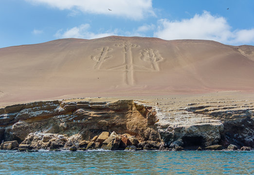 Ancient large-scale geoglyph Candelabrum figure in Paracas national park. It is a designated UNESCO World Heritage Site - Peru, South America