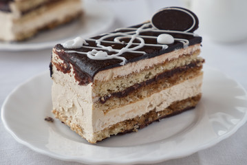 Delicious dessert cake with cream and   chocolate