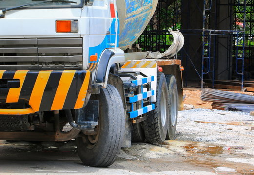 close up heavy concrete truck on construction site