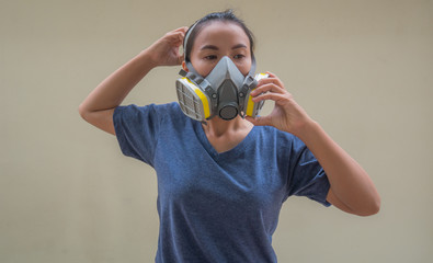 women protection cartridge respirator gas mask - close up - obrazy, fototapety, plakaty