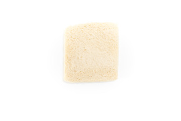 White no crust sandwich bread slice, on white background.