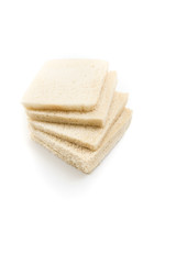 White no crust sandwich bread slices, on white background.