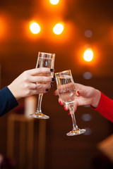 Celebration. People holding glasses of champagne making a toast
