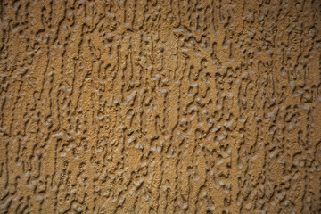 Texture of decorative finishing in gold color