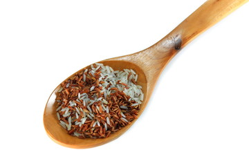 rice white and brown  in wood spoon Close up