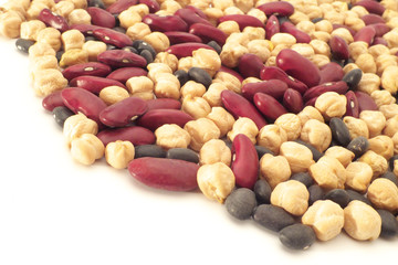 Mixed beans on white background - chickpea, kidney bean, and black bean