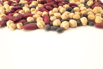 Mixed beans on white background - chickpea, kidney bean, and black bean