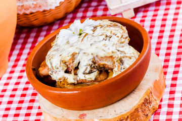Chicken baked with mushrooms and sour cream