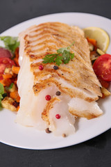 grilled fish fillet and vegetables
