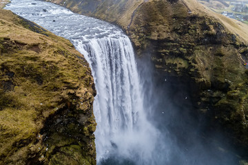 Obraz na płótnie Canvas Aerial view waterfall near of famous Skogar waterfall in Iceland.
