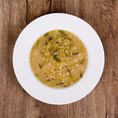 Vegetable soup on a wooden table