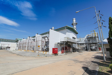 Fototapeta na wymiar Industrial power plant, Gas turbine with blue sky