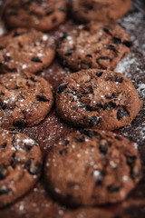 Cookies on desk on dark wooden table
