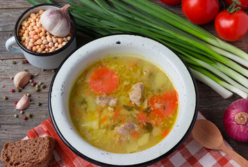 Pea soup with  greens in a plate