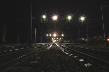 Fototapeta na wymiar Searchlights on the night railways.