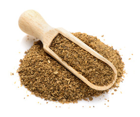 ground coriander in a scoop for spices