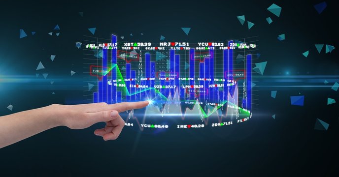 Hand touching graph on screen