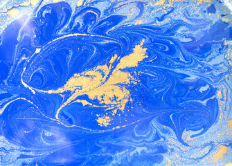 Fototapeta na wymiar Blue and golden liquid texture, watercolor hand drawn marbling illustration, abstract background