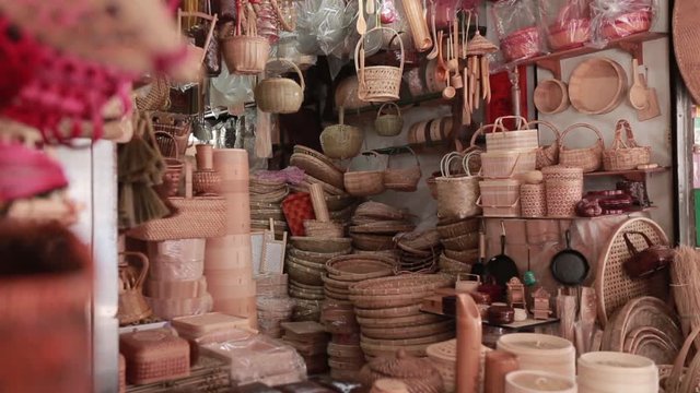 Wicker baskets and wooden utensils in a store of Dihua Street, in Taipei, Taiwan. Along with the medicine shops, Dihua Street is home to other traditional merchants, such as woven baskets.
