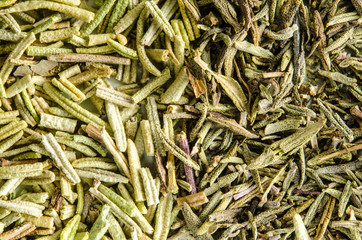 Dry thyme and rosemary leaves. Food background. Closeup macro shot. Top view.