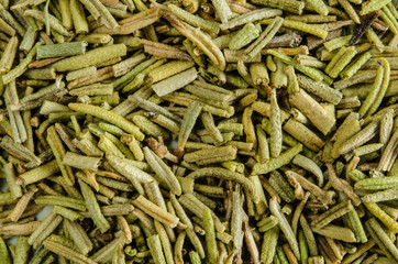 Dry leaves of rosemary. Food background. Closeup macro shot. Top view.