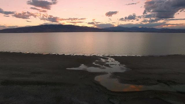 Flying over Utah Lake at dusk as the sky fades color