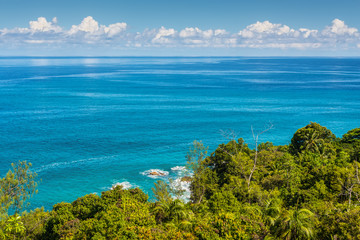 Fototapeta na wymiar View from Anse Major Nature Trail over the northwest coastline of Mahe island, Seychelles. Summer holiday concept.