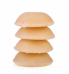 sliced palm sugar isolated on white background.