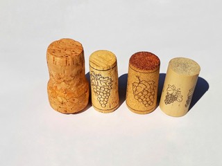 Closeup the bottle wine cork/stopper on white background, under sunlight.