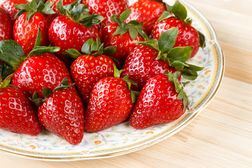 Fresh organic strawberries in a plate